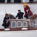 The Royal party enters the barge that will take them into Harstad (Photo: Cornelius Poppe / NTB scanpix) 